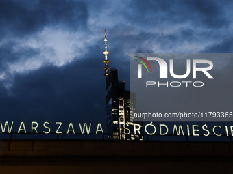 A view of of the Warszawa Srodmiescie railway station buiilding and the Palace of Culture and Science in Warsaw, Poland on November 18, 2024...