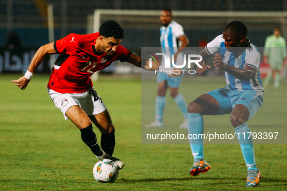 Egyptian player Omar Marmoush competes against a Botswana player during the Africa Cup of Nations Qualifiers match between Egypt and Botswan...