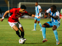 Egyptian player Omar Marmoush competes against a Botswana player during the Africa Cup of Nations Qualifiers match between Egypt and Botswan...