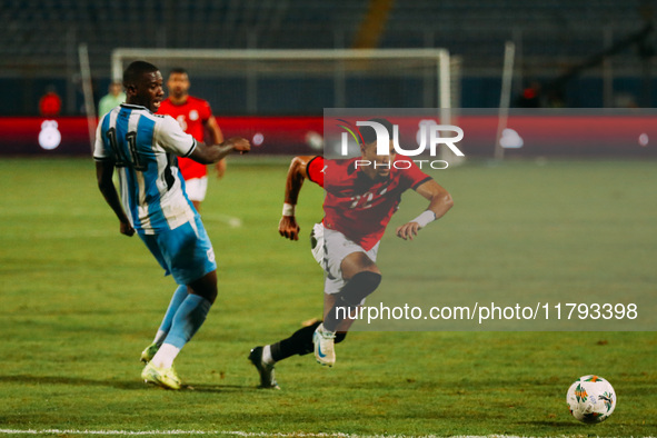 Egyptian player Nasser Maher competes against a Botswana player during the Africa Cup of Nations Qualifiers match between Egypt and Botswana...