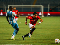 Egyptian player Nasser Maher competes against a Botswana player during the Africa Cup of Nations Qualifiers match between Egypt and Botswana...