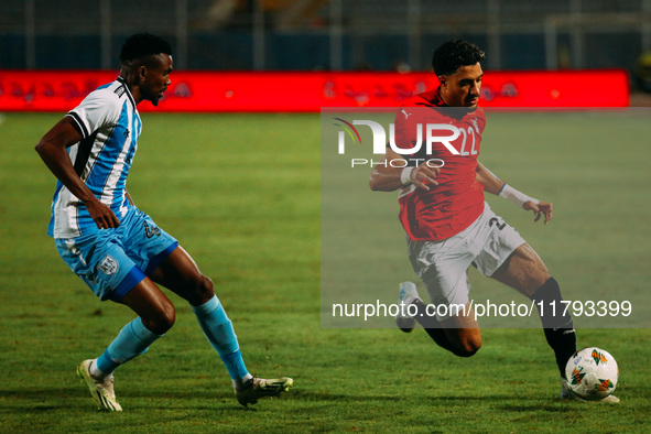 Egyptian player Omar Marmoush competes against a Botswana player during the Africa Cup of Nations Qualifiers match between Egypt and Botswan...