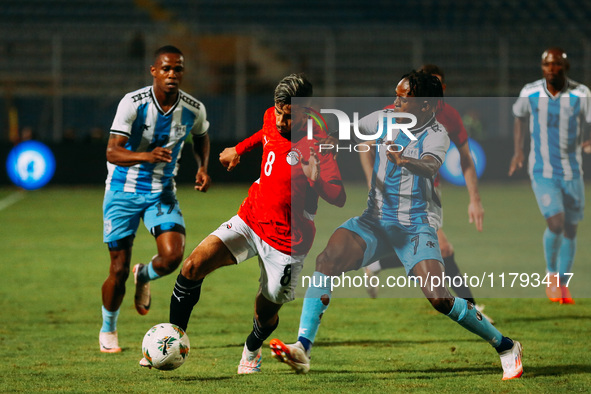 Egyptian player Nasser Maher competes against a Botswana player during the Africa Cup of Nations Qualifiers match between Egypt and Botswana...