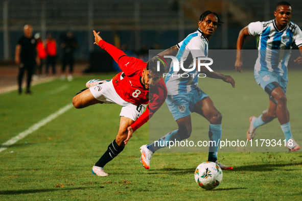 Egyptian player Nasser Maher competes against a Botswana player during the Africa Cup of Nations Qualifiers match between Egypt and Botswana...