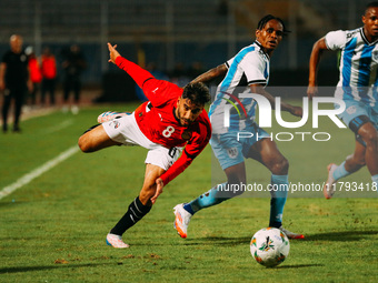 Egyptian player Nasser Maher competes against a Botswana player during the Africa Cup of Nations Qualifiers match between Egypt and Botswana...