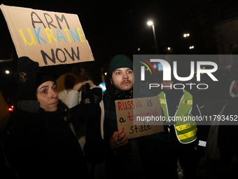 A protest is organized on the 1000th day of the war in Ukraine opposite the Embassy of the Russian Federation in Warsaw, Poland, on November...