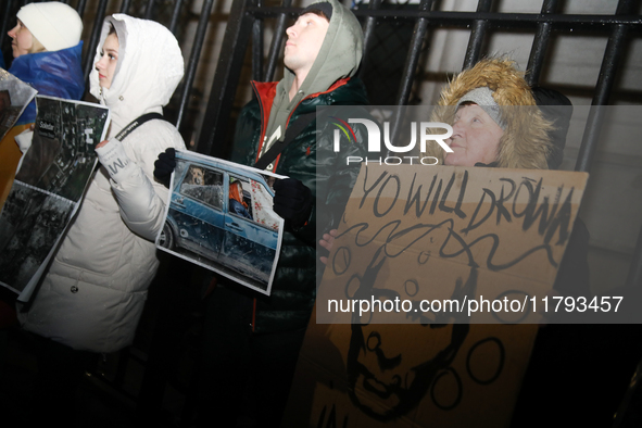 A protest is organized on the 1000th day of the war in Ukraine opposite the Embassy of the Russian Federation in Warsaw, Poland, on November...