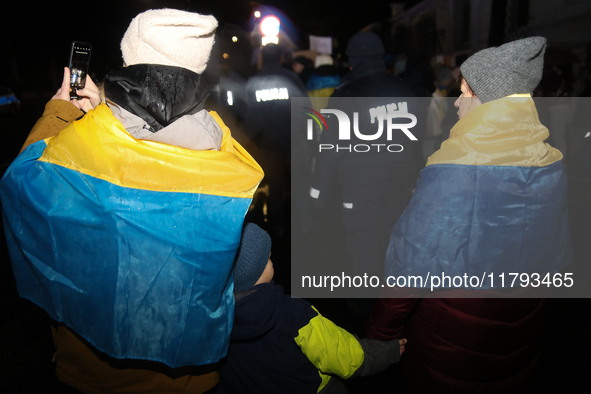 A protest is organized on the 1000th day of the war in Ukraine opposite the Embassy of the Russian Federation in Warsaw, Poland, on November...