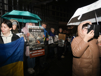 A protest is organized on the 1000th day of the war in Ukraine opposite the Embassy of the Russian Federation in Warsaw, Poland, on November...