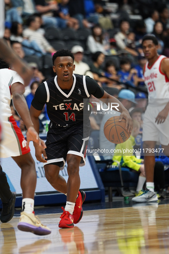 Tyson Walker #14 of Texas Legends handles the ball against Memphis Hustle during the NBA G League regular season match at Comerica Center in...