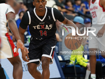 Tyson Walker #14 of Texas Legends handles the ball against Memphis Hustle during the NBA G League regular season match at Comerica Center in...