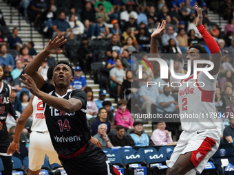 Tyson Walker #14 of Texas Legends shoots the ball against Memphis Hustle during the NBA G League regular season match at Comerica Center in...