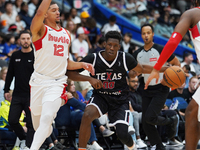 Jazian Gortman #00 of Texas Legends drives to the basket against Memphis Hustle during the NBA G League regular season match at Comerica Cen...