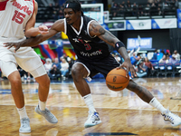 Emanuel Miller #3 of Texas Legends drives to the basket against Memphis Hustle during the NBA G League regular season match at Comerica Cent...