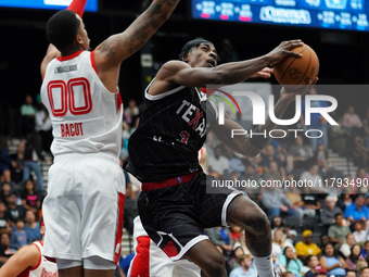 Emanuel Miller #3 of Texas Legends drives to the basket against Memphis Hustle during the NBA G League regular season match at Comerica Cent...