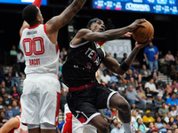 Emanuel Miller #3 of Texas Legends drives to the basket against Memphis Hustle during the NBA G League regular season match at Comerica Cent...