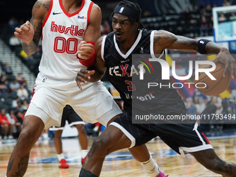 Emanuel Miller #3 of Texas Legends drives to the basket against Memphis Hustle during the NBA G League regular season match at Comerica Cent...