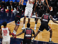 Miles Norris #8 of Memphis Hustle drives to the basket against Texas Legends during the NBA G League regular season match at Comerica Center...