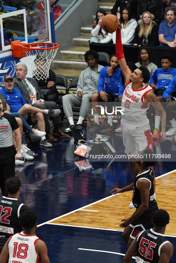 Miles Norris #8 of Memphis Hustle slam dunks the ball against Texas Legends during the NBA G League regular season match at Comerica Center...