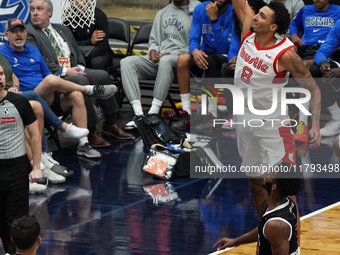 Miles Norris #8 of Memphis Hustle slam dunks the ball against Texas Legends during the NBA G League regular season match at Comerica Center...