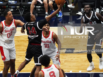 Tyson Walker #14 of the Texas Legends drives to the basket against the Memphis Hustle during the NBA G League regular season match at Comeri...