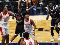 Tyson Walker #14 of the Texas Legends drives to the basket against the Memphis Hustle during the NBA G League regular season match at Comeri...