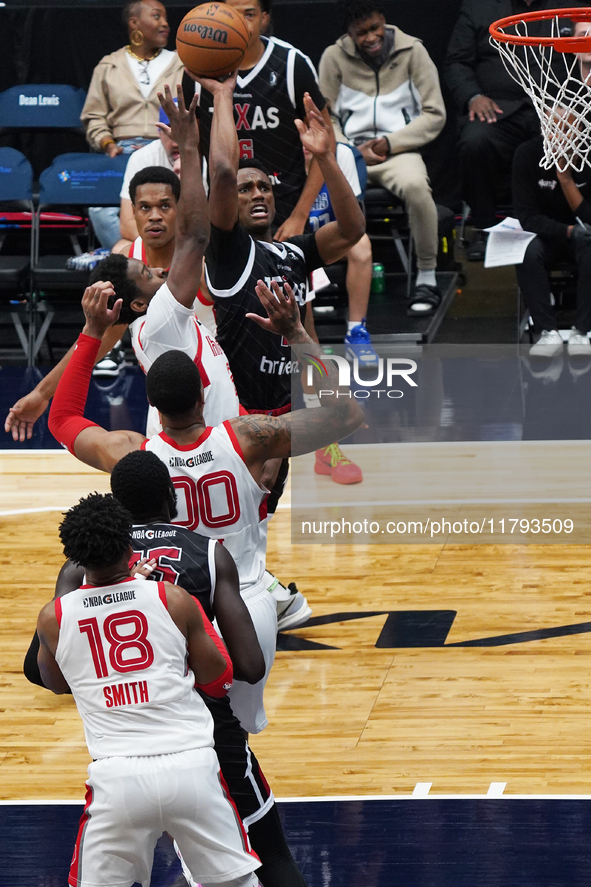 Tyson Walker #14 of Texas Legends shoots the ball against Memphis Hustle during the NBA G League regular season match at Comerica Center in...