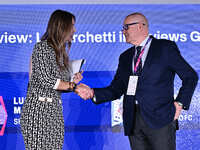 Marina Presello of SKY and Giovanni Gardini of PALERMO FC participate in the Social Football Summit 2024 at the Olympic Stadium in Rome, Ita...