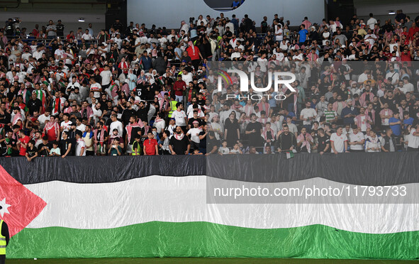 Soccer fans cheers during the AFC Asian Qualifiers Road to 26 match between Kuwait and Jordan in Kuwait City, Kuwait, on 19 November 2024, a...