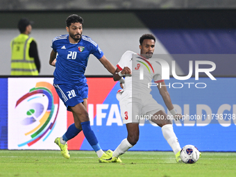 Yousef Alsulaiman of Kuwait competes against Abdallah Nasib of Jordan during the AFC Asian Qualifiers Road to 26 match between Kuwait and Jo...