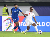 Yousef Alsulaiman of Kuwait competes against Abdallah Nasib of Jordan during the AFC Asian Qualifiers Road to 26 match between Kuwait and Jo...