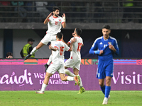 Yazan Alnaimat of Jordan celebrates with teammates after scoring a goal during the AFC Asian Qualifiers Road to 26 match between Kuwait and...