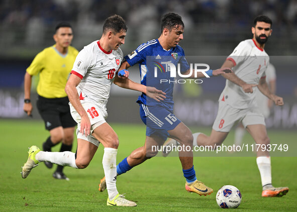 Yosef Alshammari of Kuwait competes against Mohammad Abualnadi of Jordan during the AFC Asian Qualifiers Road to 26 match between Kuwait and...