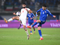 Sultan Alenezi of Kuwait competes against Nizar Alrashdan of Jordan during the AFC Asian Qualifiers Road to 26 match between Kuwait and Jord...