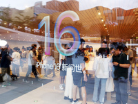 Customers shop at the largest Apple flagship store in Asia in Shanghai, China, on September 22, 2024. (