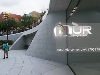 Customers shop at the largest Apple flagship store in Asia in Shanghai, China, on September 22, 2024. (