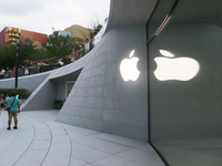 Customers shop at the largest Apple flagship store in Asia in Shanghai, China, on September 22, 2024. (