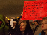 Two hundred people take part in a demonstration to mark 1,000 days since the full-scale war between Ukraine and Russia in Cologne, Germany,...