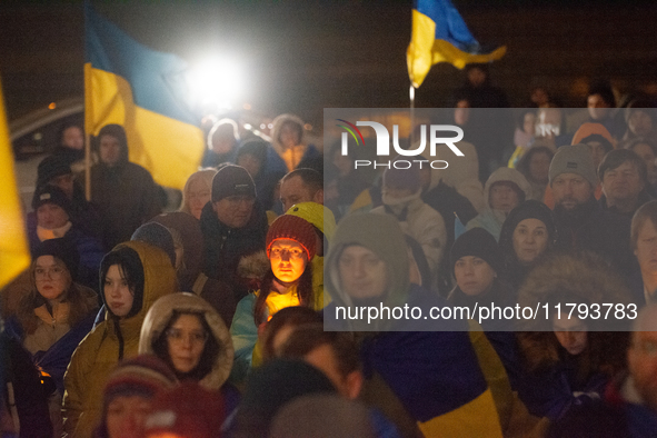 Two hundred people take part in a demonstration to mark 1,000 days since the full-scale war between Ukraine and Russia in Cologne, Germany,...