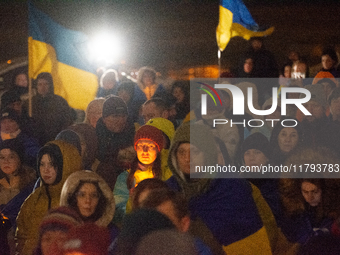 Two hundred people take part in a demonstration to mark 1,000 days since the full-scale war between Ukraine and Russia in Cologne, Germany,...