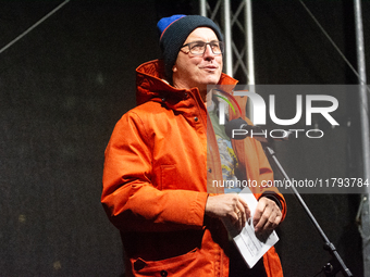 Andreas Wolter, Mayor of the City of Cologne, speaks on the stage as two hundred people take part in a demonstration to mark 1000 days since...