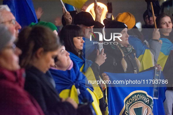 Two hundred people take part in a demonstration to mark 1,000 days since the full-scale war between Ukraine and Russia in Cologne, Germany,...