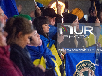 Two hundred people take part in a demonstration to mark 1,000 days since the full-scale war between Ukraine and Russia in Cologne, Germany,...