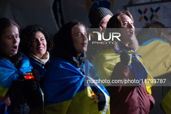 Two hundred people take part in a demonstration to mark 1,000 days since the full-scale war between Ukraine and Russia in Cologne, Germany,...