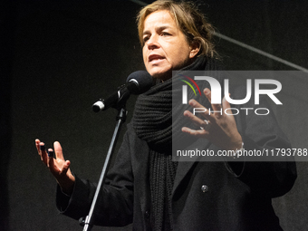 Mona Neubaur, NRW state minister of economy, speaks on the stage as two hundred people take part in a demonstration to mark 1000 days since...