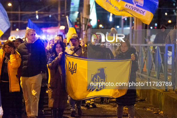 Two hundred people take part in a demonstration to mark 1,000 days since the full-scale war between Ukraine and Russia in Cologne, Germany,...