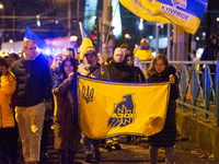 Two hundred people take part in a demonstration to mark 1,000 days since the full-scale war between Ukraine and Russia in Cologne, Germany,...