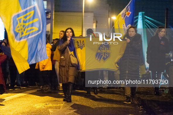 Two hundred people take part in a demonstration to mark 1,000 days since the full-scale war between Ukraine and Russia in Cologne, Germany,...