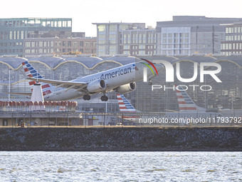 American Airlines Boeing 737 MAX 8 passenger aircraft spotted during takeoff and flying in front of the airport terminal, air traffic contro...