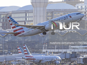 American Airlines Boeing 737 MAX 8 passenger aircraft spotted during takeoff and flying in front of the airport terminal, air traffic contro...